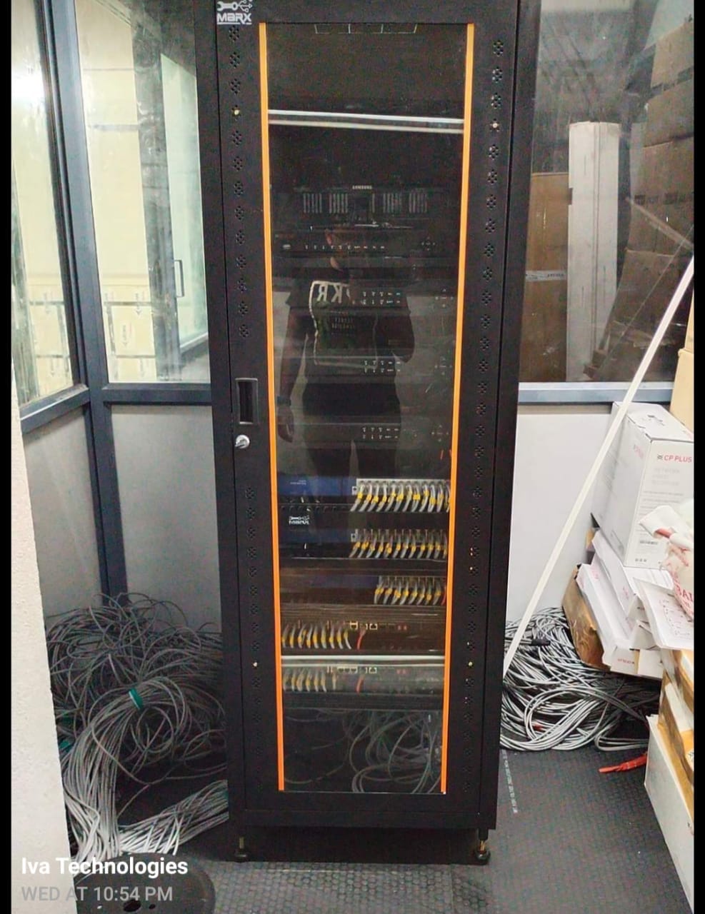 Installed network rack with switches and organised patch cabling